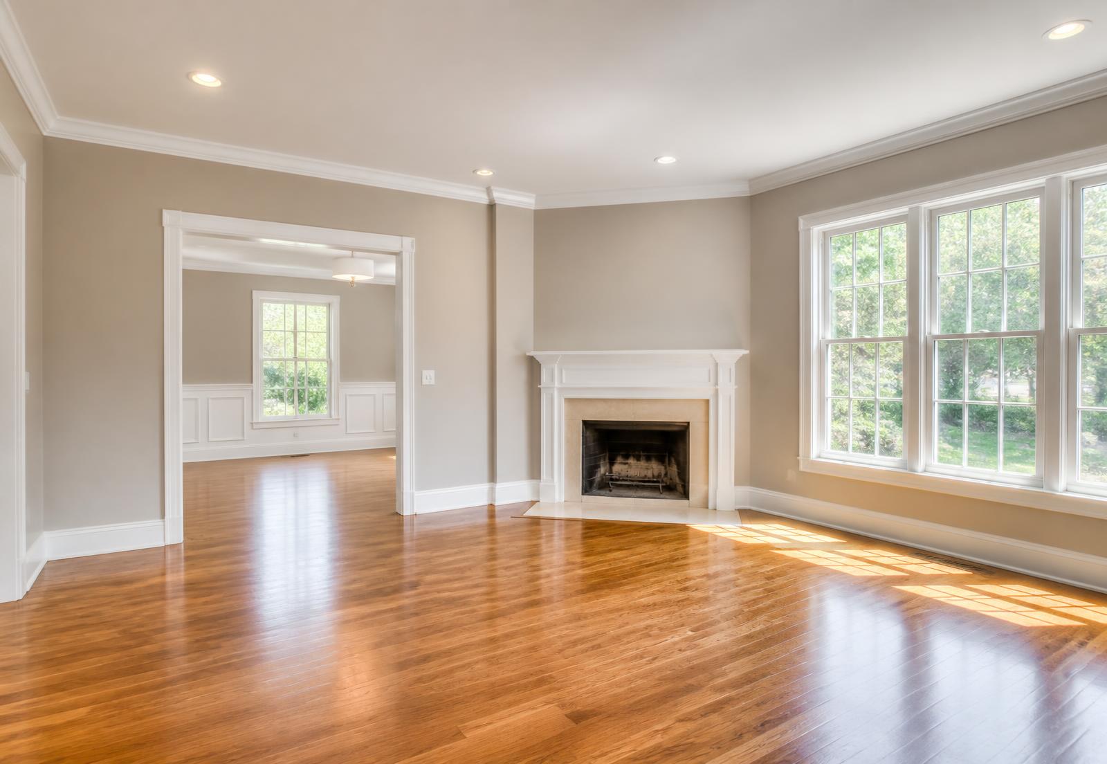 Freshly painted living room with clean white trim